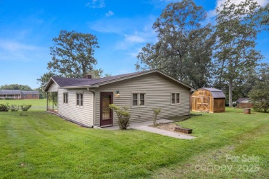 Well-maintained home on a spacious 3.28 acre corner lot in the