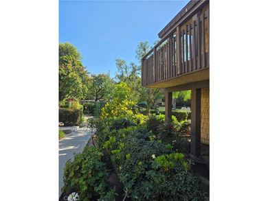 This top-floor end-unit townhome offers a spacious living room - photo 15