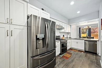 Welcome to this beautifully upgraded townhome nestled in the - photo 9