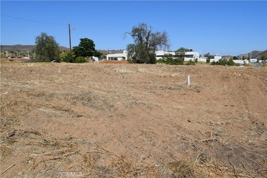 Here's an opportunity to own a flat and buildable lot in the - photo 2