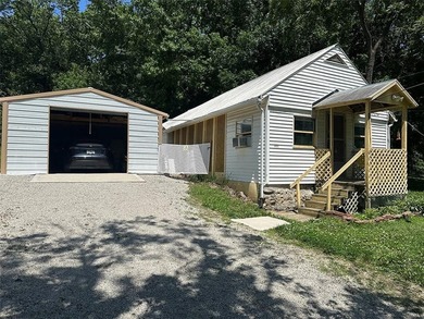 Tarsney Lake house on 4 lots! Cash only as this is more like a - photo 1