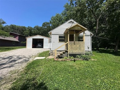 Tarsney Lake house on 4 lots! Cash only as this is more like a - photo 3