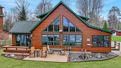 Experience Northwoods lake living at its finest on the - photo 1