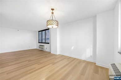 Just renovated. Spacious one bedroom, one bath corner unit. The