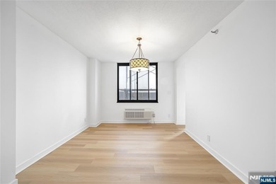Just renovated. Spacious one bedroom, one bath corner unit. The
