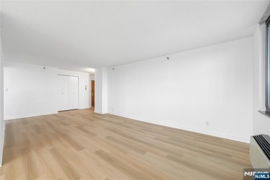 Just renovated. Spacious one bedroom, one bath corner unit. The