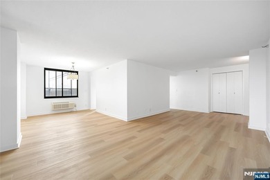 Just renovated. Spacious one bedroom, one bath corner unit. The