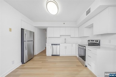 Just renovated. Spacious one bedroom, one bath corner unit. The