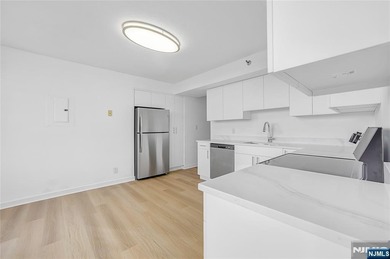 Just renovated. Spacious one bedroom, one bath corner unit. The