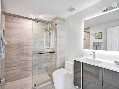 Beautifully Renovated wrap-around condo features 3BR, 2.5BA with - photo 18
