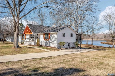 Waterfront living at its best! This newly renovated one-story - photo 2