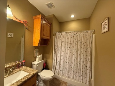 This beautiful custom-built 3-bedroom, 2.5-bath brick home sits - photo 12