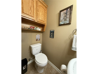 This beautiful custom-built 3-bedroom, 2.5-bath brick home sits - photo 14