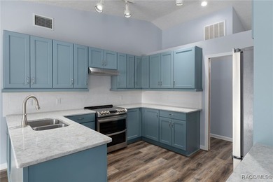 Tucked within the highly sought-after Riverhaven Village - photo 13
