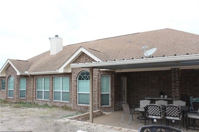 This beautiful custom-built 3-bedroom, 2.5-bath brick home sits - photo 16