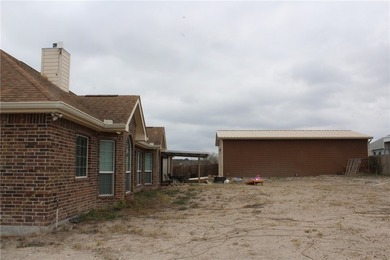 This beautiful custom-built 3-bedroom, 2.5-bath brick home sits - photo 18