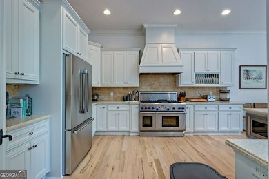 Nestled in the coveted Waterfall at Lake Burton community, this - photo 17