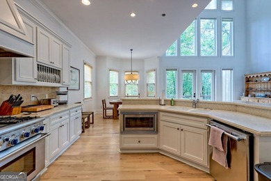 Nestled in the coveted Waterfall at Lake Burton community, this - photo 18