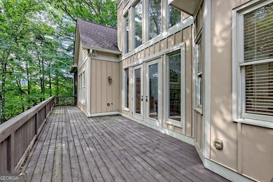 Nestled in the coveted Waterfall at Lake Burton community, this - photo 22