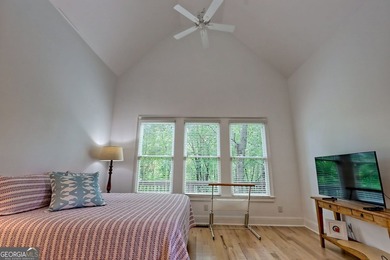 Nestled in the coveted Waterfall at Lake Burton community, this - photo 26
