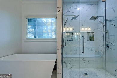 Nestled in the coveted Waterfall at Lake Burton community, this - photo 33