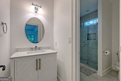 Nestled in the coveted Waterfall at Lake Burton community, this - photo 44