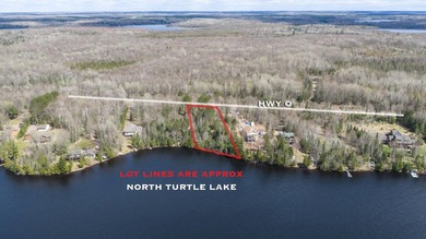 Beautifully wooded lakefront lot located on North Turtle Lake in - photo 1