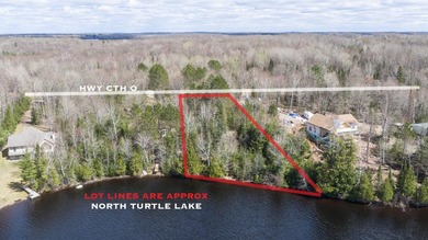 Beautifully wooded lakefront lot located on North Turtle Lake in - photo 3