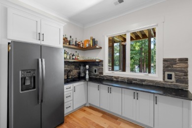 A waterfront masterpiece boasting custom curated features - photo 16