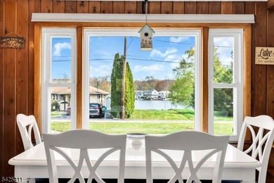 Charming Craftsman Expanded Ranch with Lake Views & Turn-Key! - photo 11
