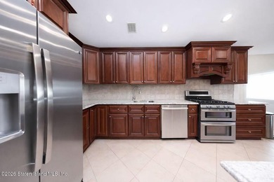 Stunning Two Family Semi-Attached home conveniently located to - photo 11