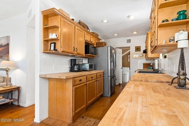 Tucked into two wooded acres of towering ponderosa pine, this is - photo 11