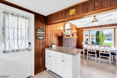 Charming Craftsman Expanded Ranch with Lake Views & Turn-Key! - photo 12