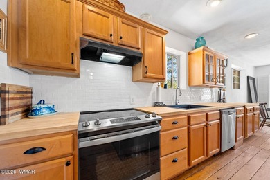 Tucked into two wooded acres of towering ponderosa pine, this is - photo 13