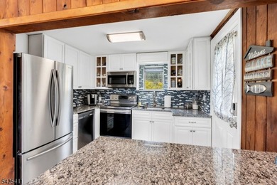 Charming Craftsman Expanded Ranch with Lake Views & Turn-Key! - photo 15