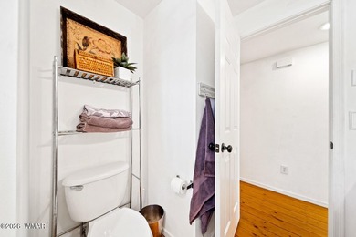 Tucked into two wooded acres of towering ponderosa pine, this is - photo 16