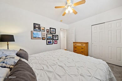 Tucked into two wooded acres of towering ponderosa pine, this is - photo 18