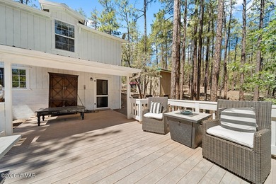 Tucked into two wooded acres of towering ponderosa pine, this is - photo 30