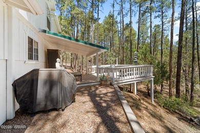 Tucked into two wooded acres of towering ponderosa pine, this is - photo 31