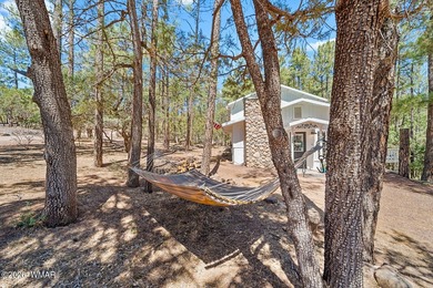 Tucked into two wooded acres of towering ponderosa pine, this is - photo 35