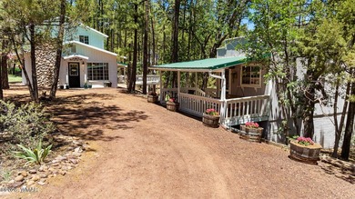 Tucked into two wooded acres of towering ponderosa pine, this is - photo 37