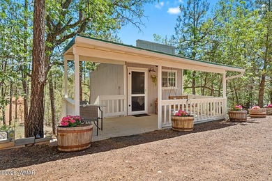 Tucked into two wooded acres of towering ponderosa pine, this is - photo 38