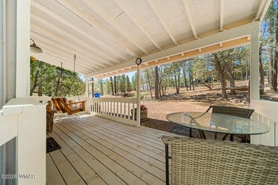 Tucked into two wooded acres of towering ponderosa pine, this is - photo 39