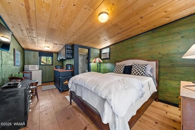 Tucked into two wooded acres of towering ponderosa pine, this is - photo 41