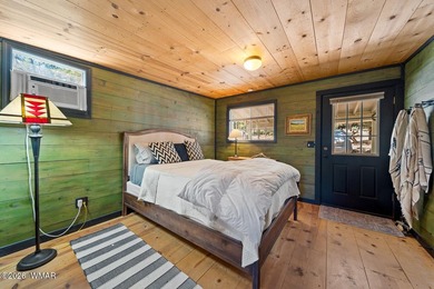 Tucked into two wooded acres of towering ponderosa pine, this is - photo 43
