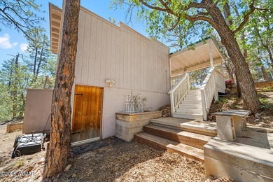 Tucked into two wooded acres of towering ponderosa pine, this is - photo 47