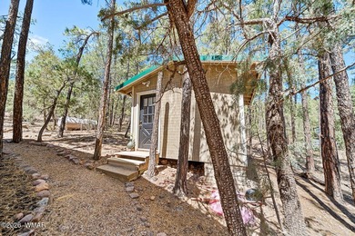 Tucked into two wooded acres of towering ponderosa pine, this is - photo 50