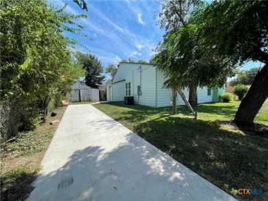 This exceptional property, situated on a high-exposure corner