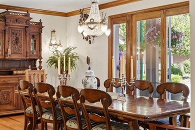 Perched behind a grand gated entrance and winding tree-lined - photo 15
