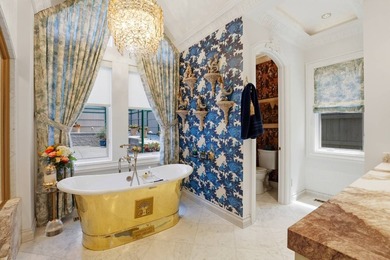 Perched behind a grand gated entrance and winding tree-lined - photo 18
